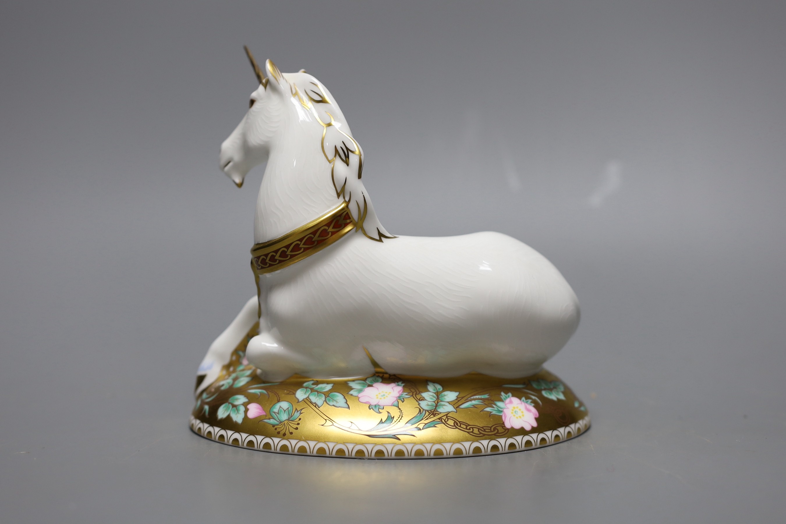A limited edition Royal Crown Derby paperweight - Mythical Unicorn, gold stopper, boxed, no certificate, 735/1750